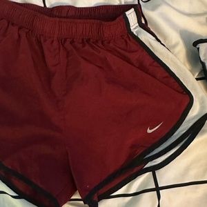 red nike running shorts